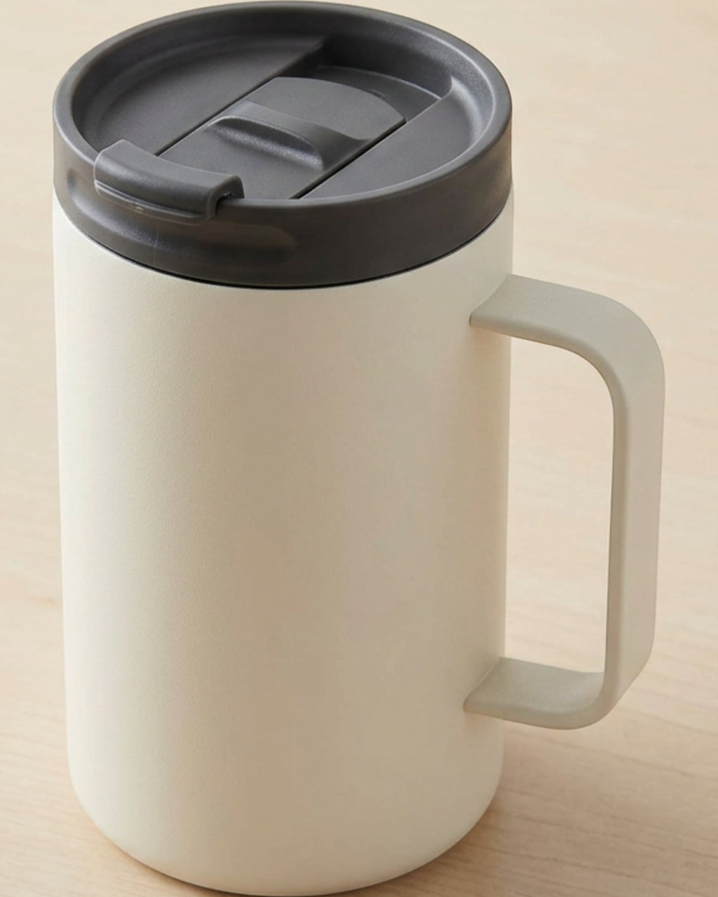 Tavlu 24 oz Handled Stainless Steel Vacuum Commuter Mug with Push-Button Lid Cream - Lifestyle view