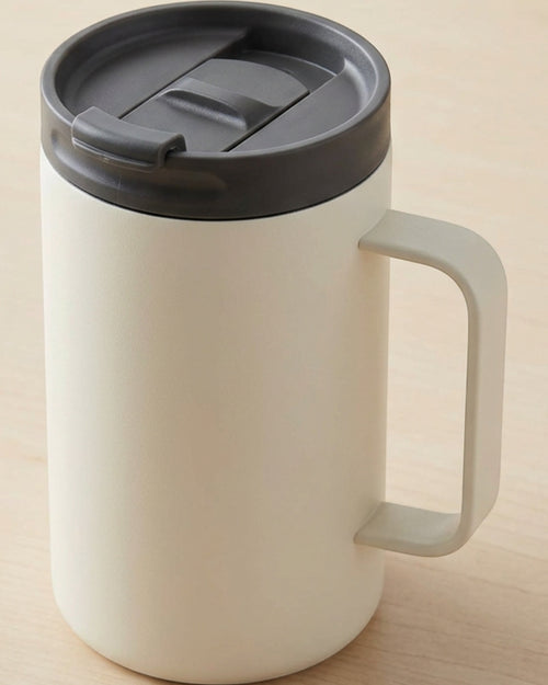 Tavlu 24 oz Handled Stainless Steel Vacuum Commuter Mug with Push-Button Lid Cream - Lifestyle view
